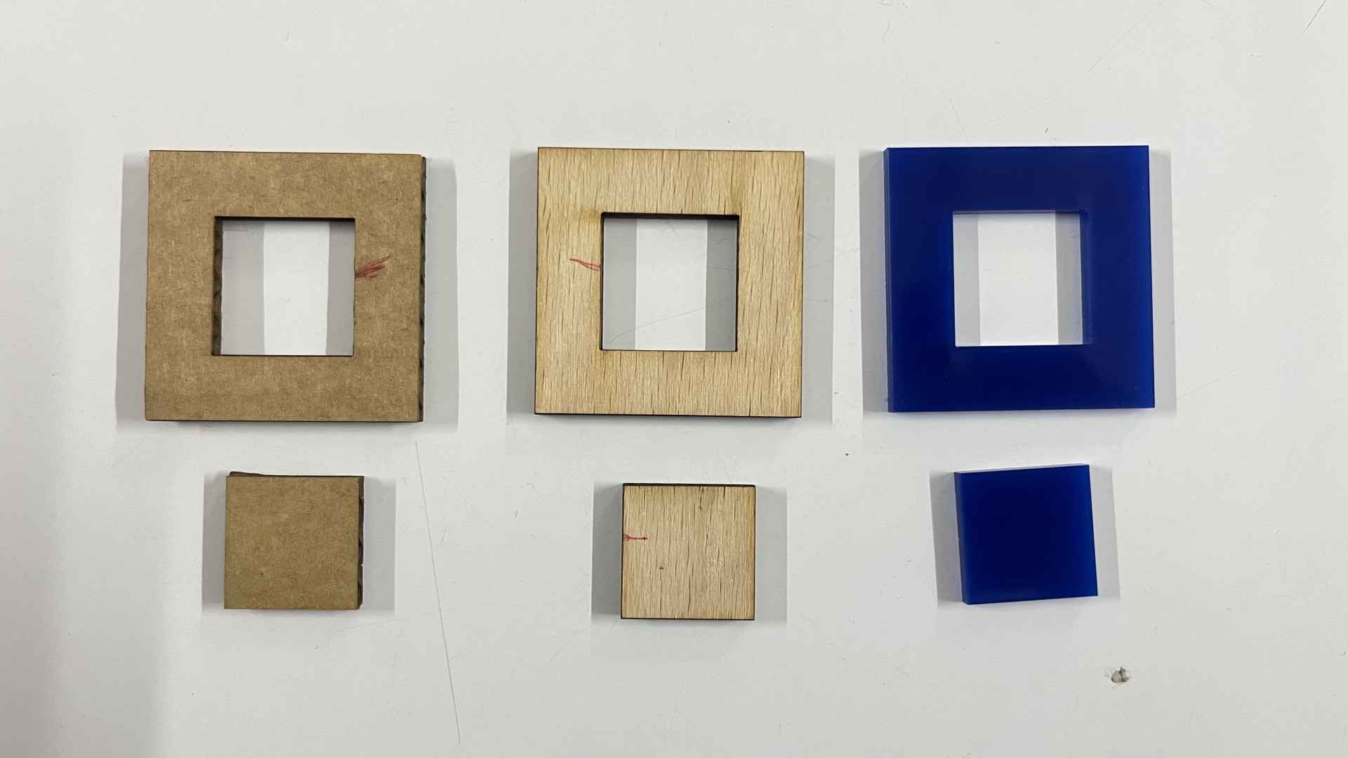 Kerf test pieces for cardboard, wood, and acrylic